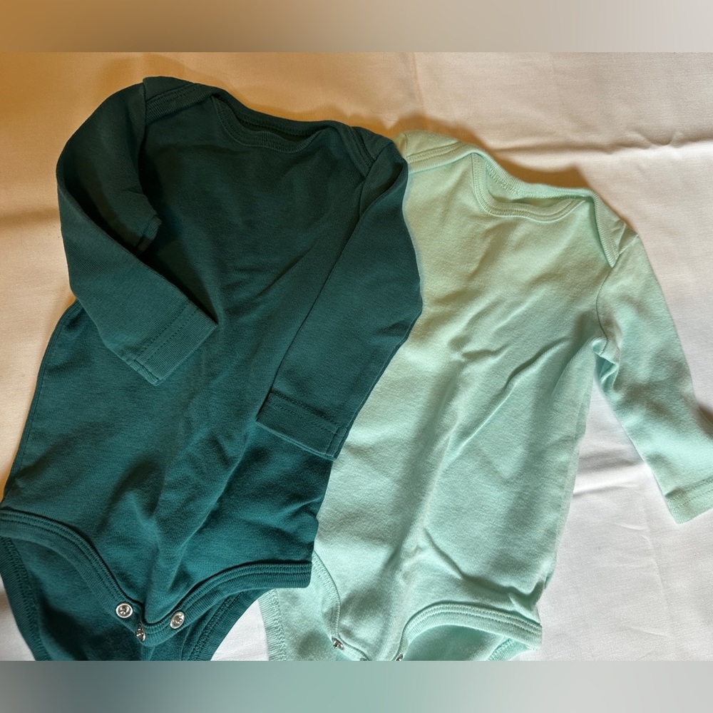 Two 0-3 primary onesies